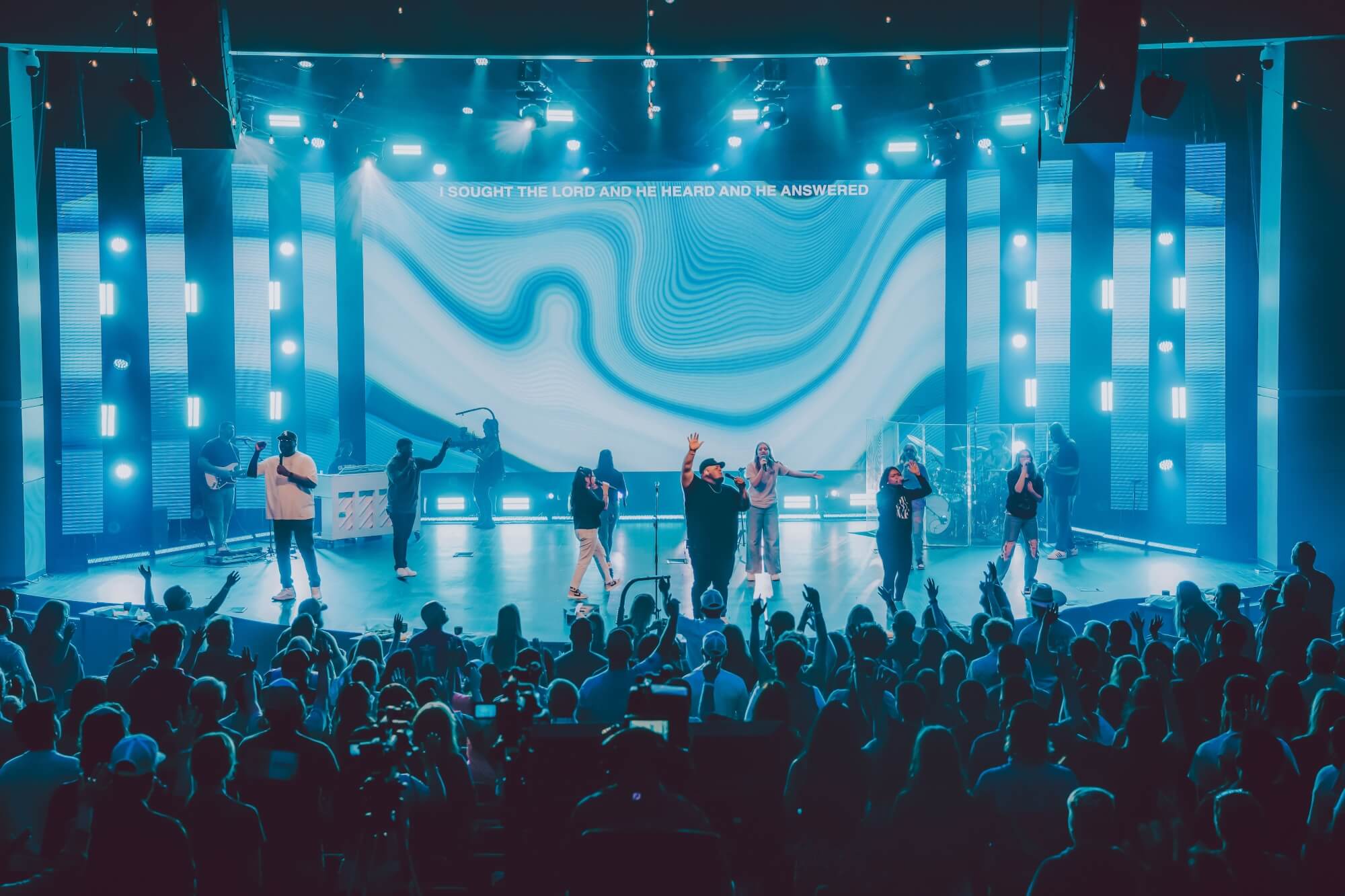 On-stage worship performance at Crossroads